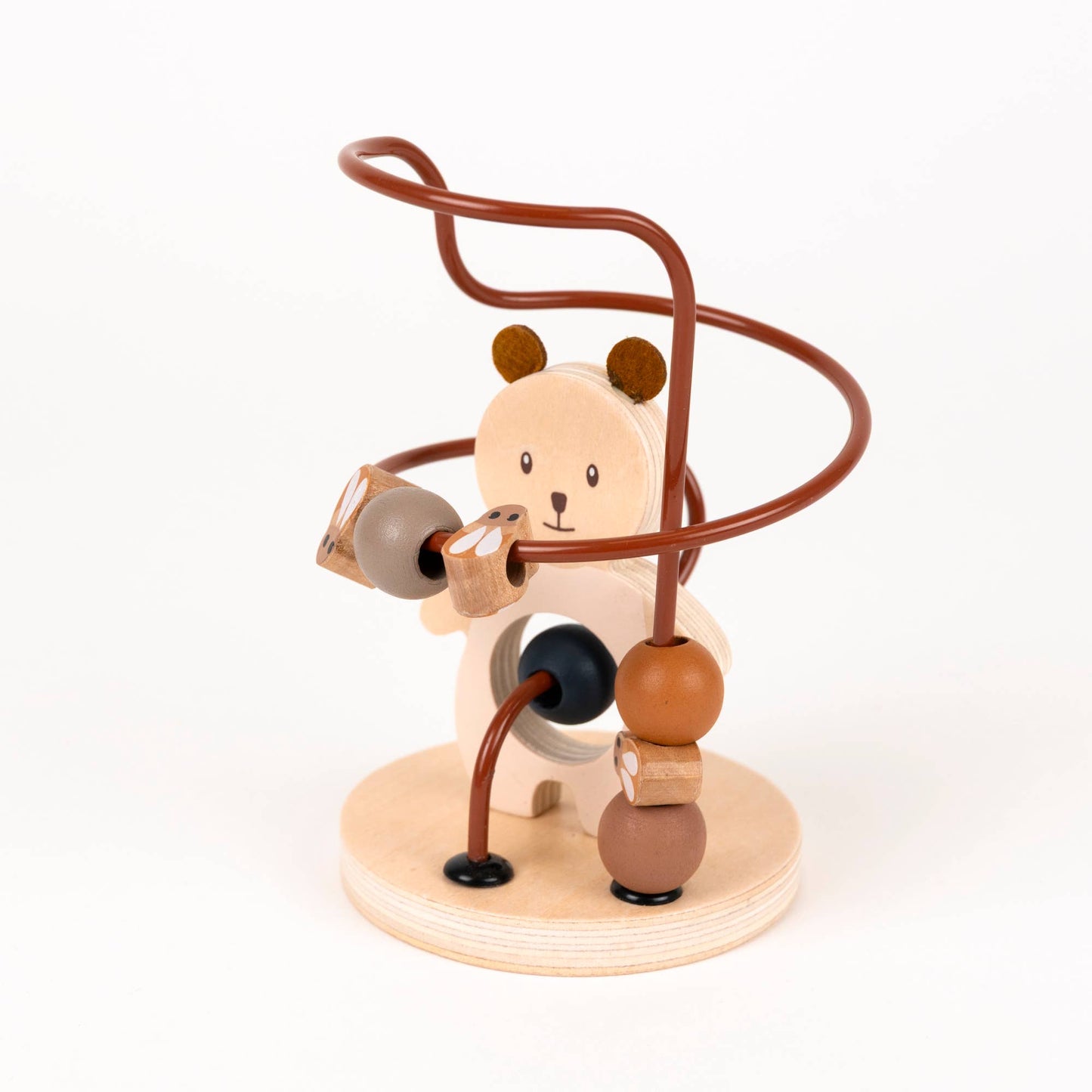 Wooden toy with a bear design on a white background