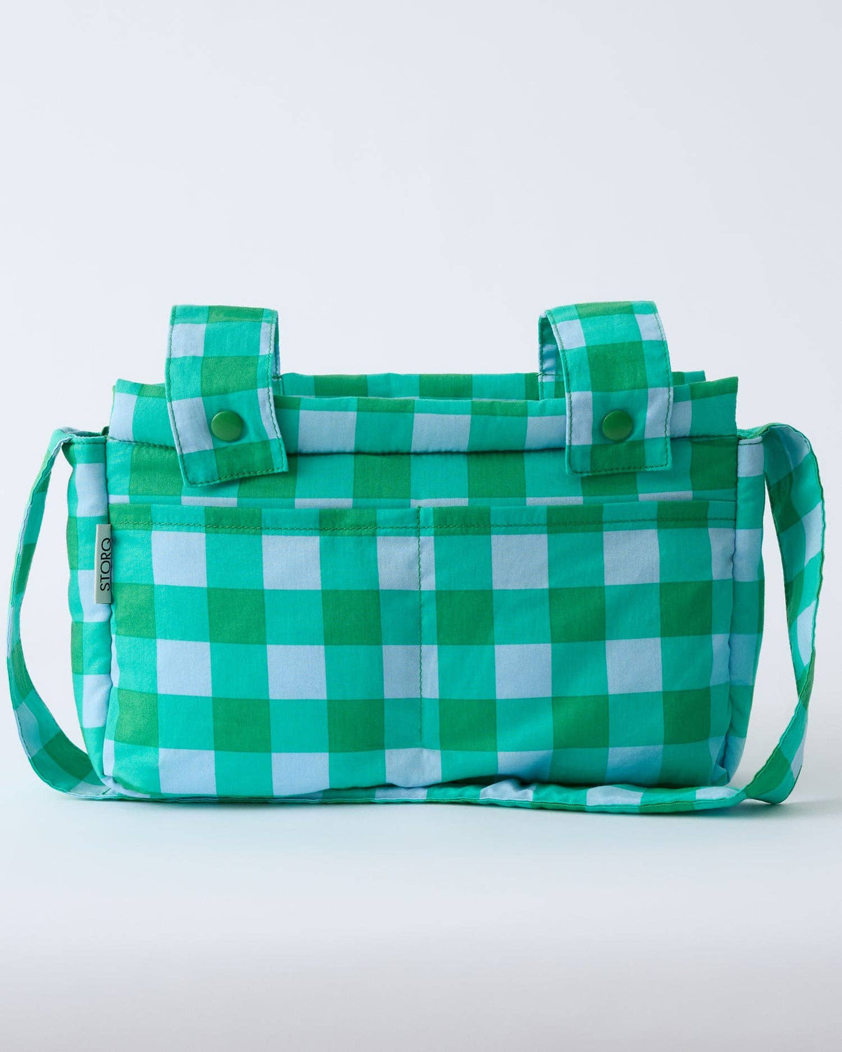 A green and white gingham checkered tote bag with a top handle and a shoulder strap, shown against a plain white background.