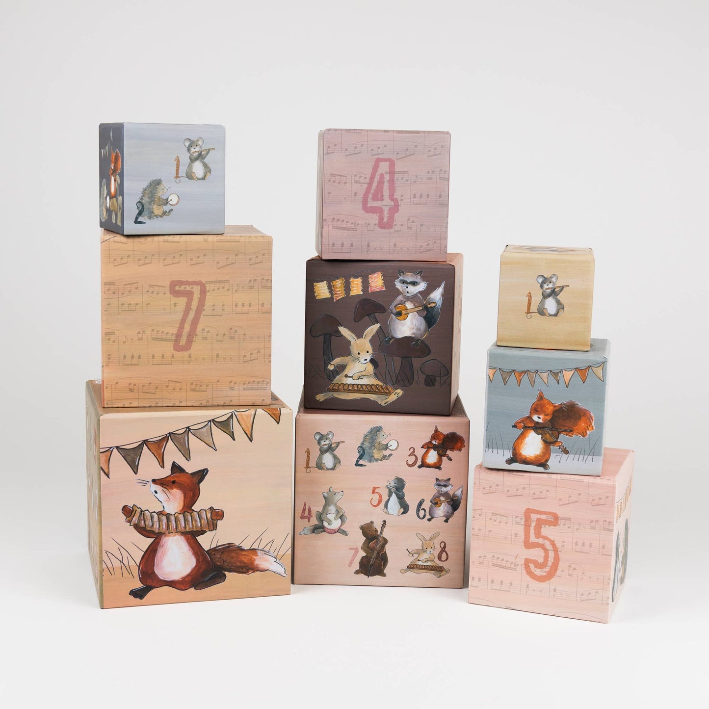 Set of coated paper blocks with animal illustrations and numbers on a white background