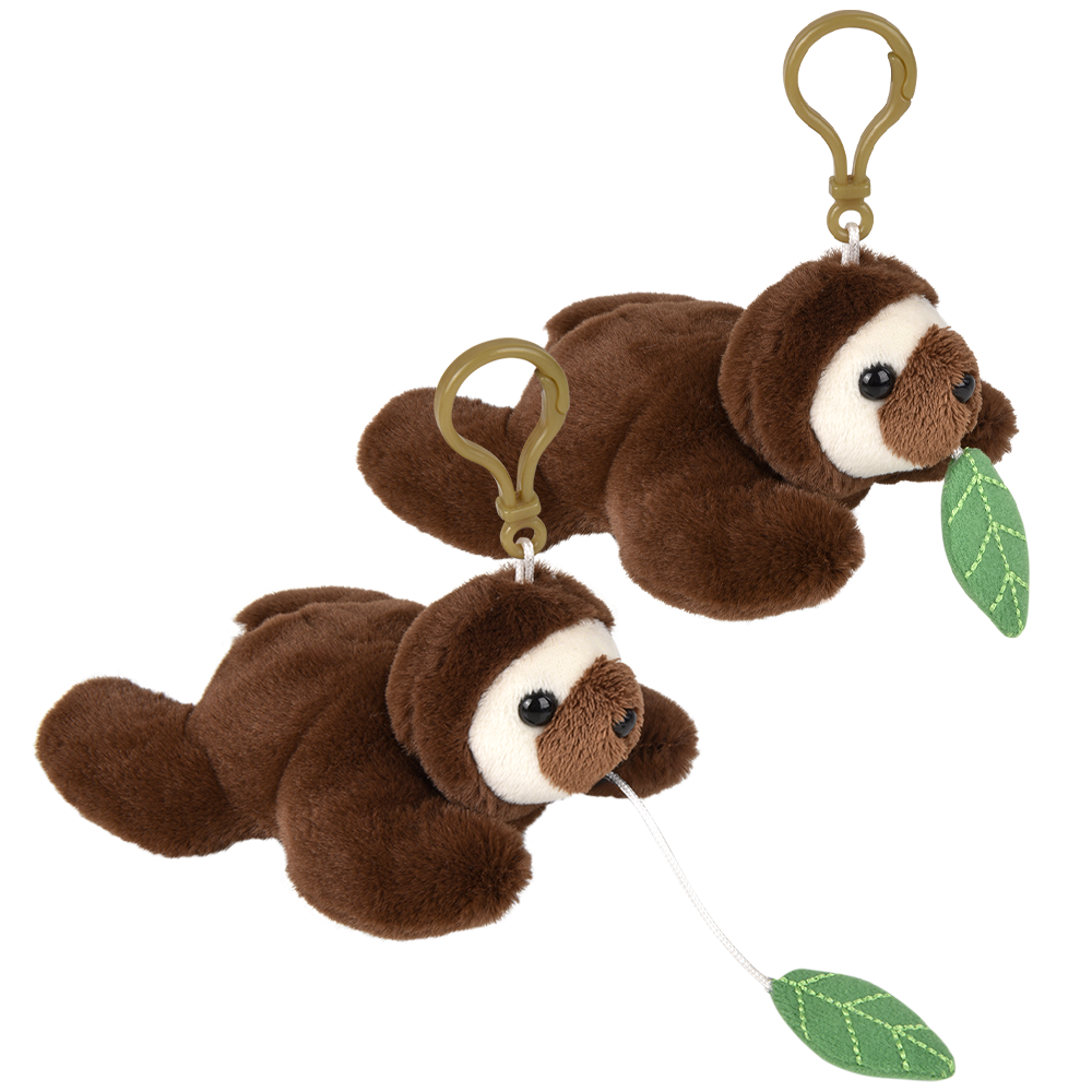Two small plush sloth keychains on a plain white background. Each sloth is brown with a white face and holds a green leaf, attached to a gold-tone clip.