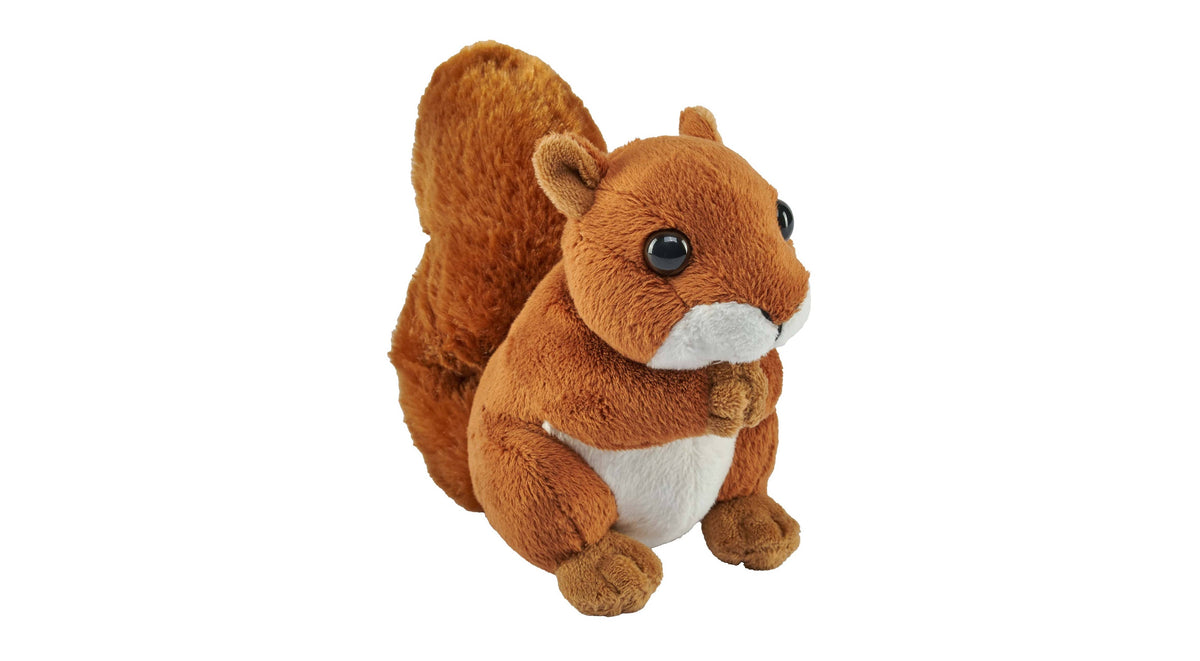 A plush toy squirrel in a sitting position, holding a nut, featuring brown fur with a white chest and belly, set against a plain white background.