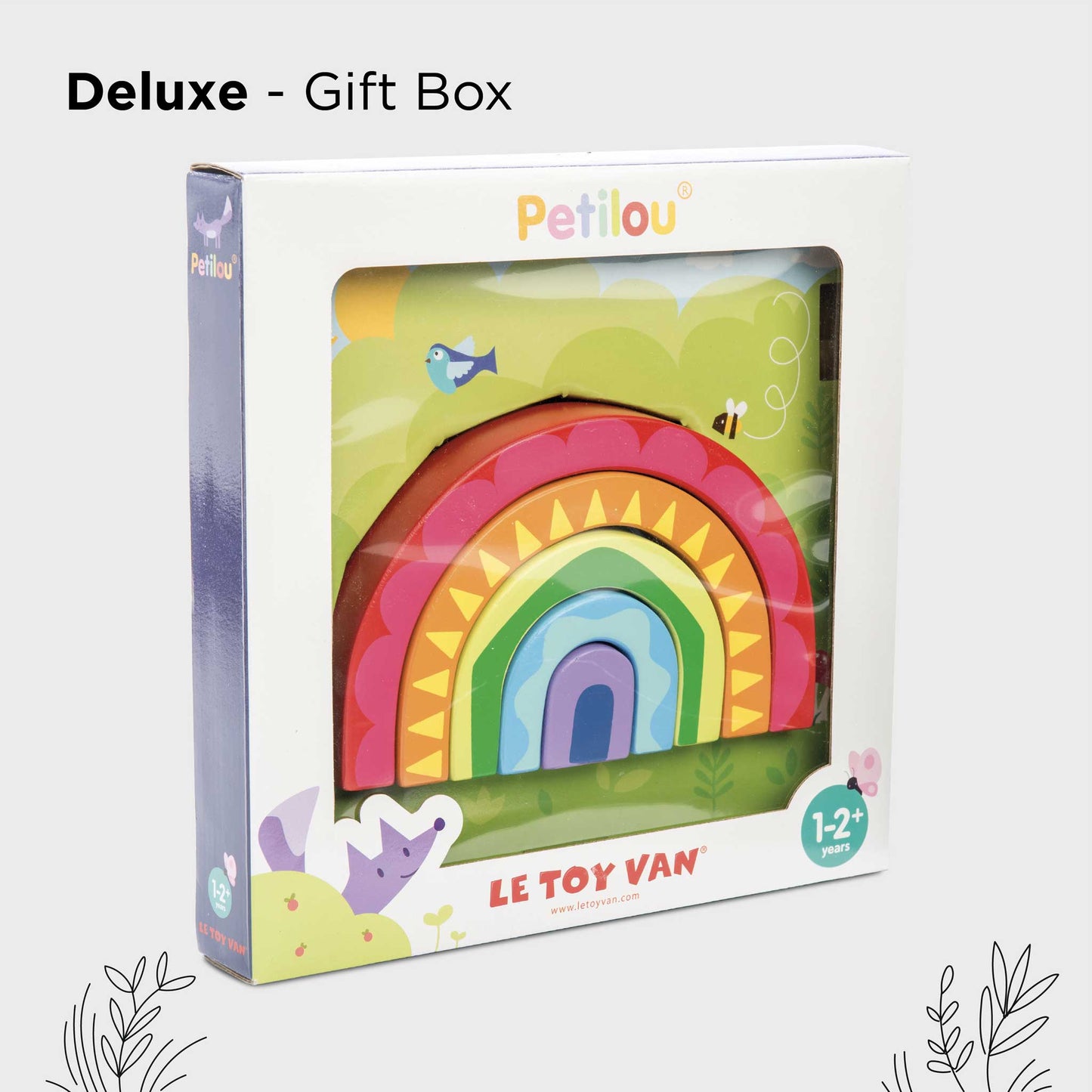 Deluxe gift box with colorful rainbow design and 'Petitou' branding on a white background.