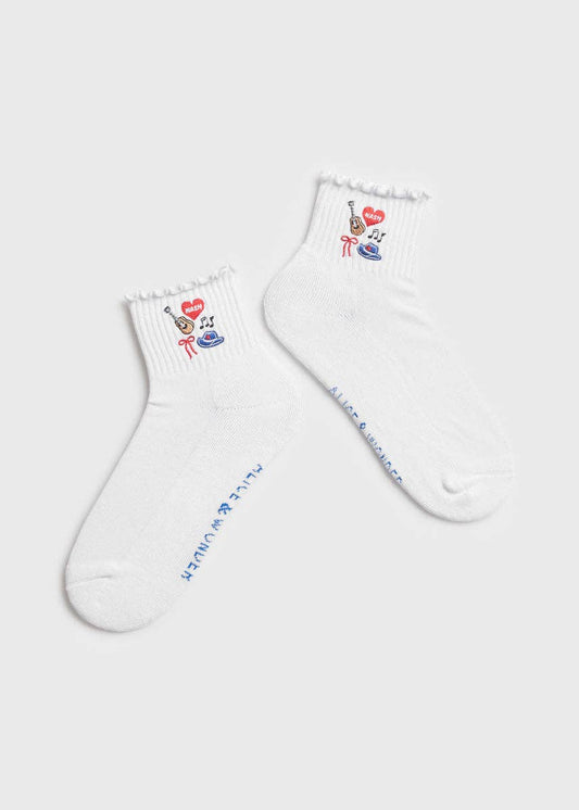 Two white socks with colorful designs on a light gray background