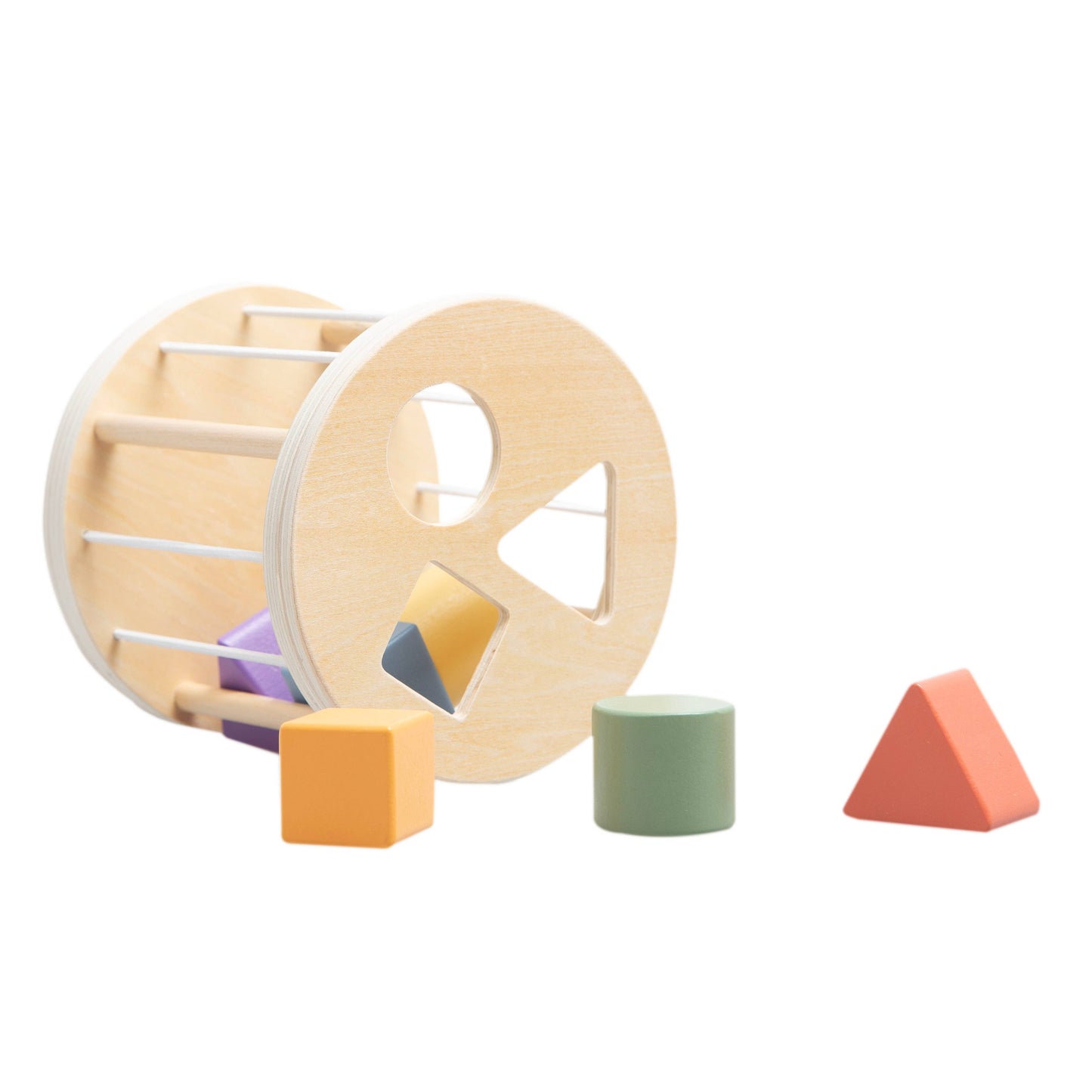 Wooden shape sorter toy with various geometric shapes on a white background