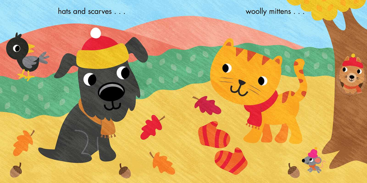 A cartoon dog and cat wear scarves and winter accessories to stay warm on their nature walk.
