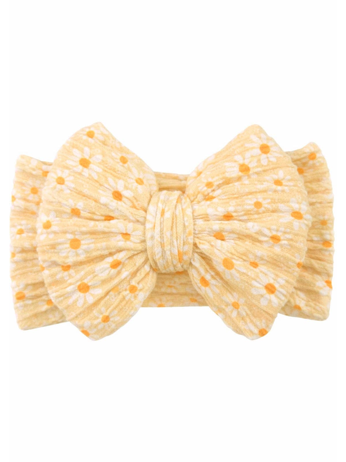 Yellow flower polka dot bow headband on a white background