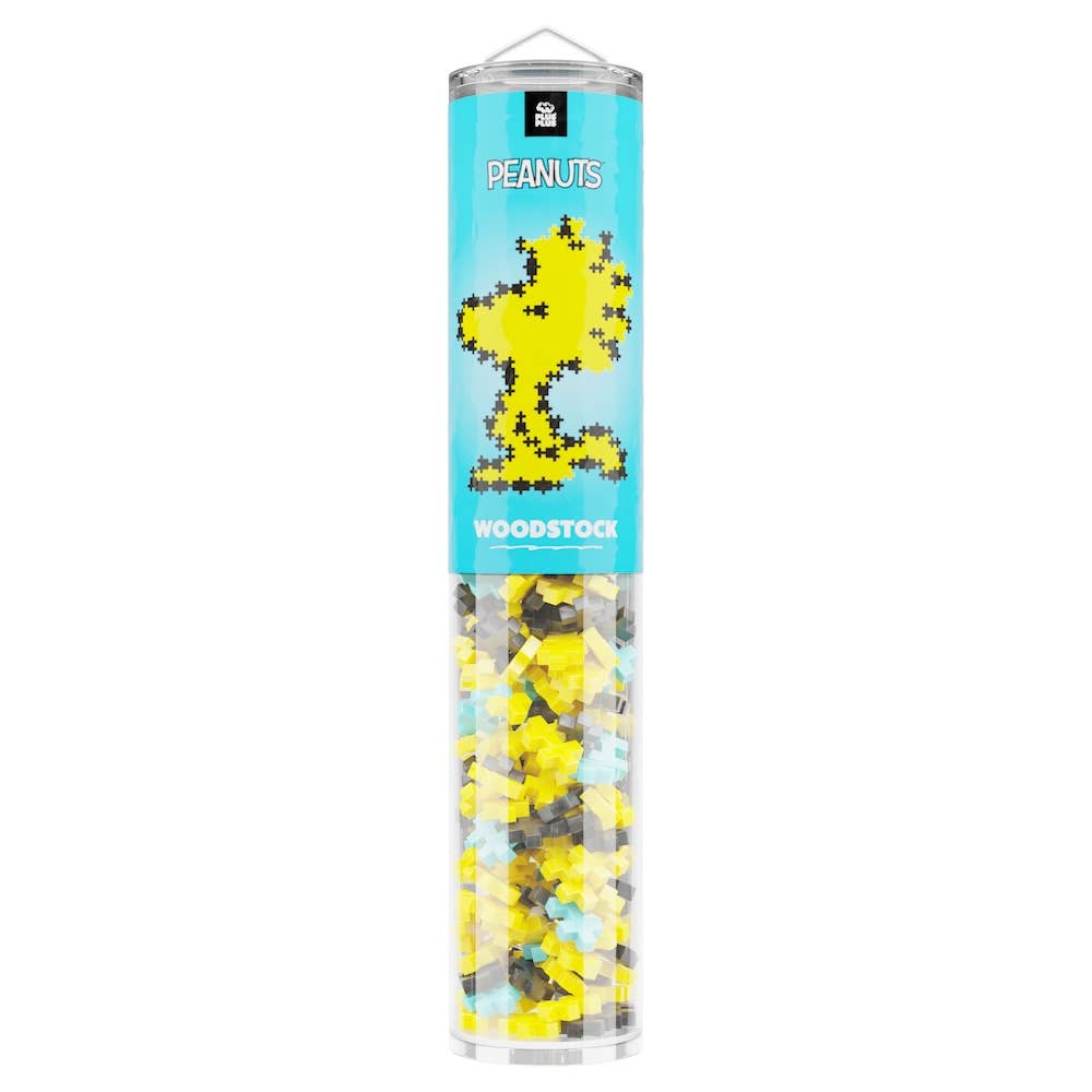 Tube of Peanuts Woodstock puzzle pieces with colorful design on a white background