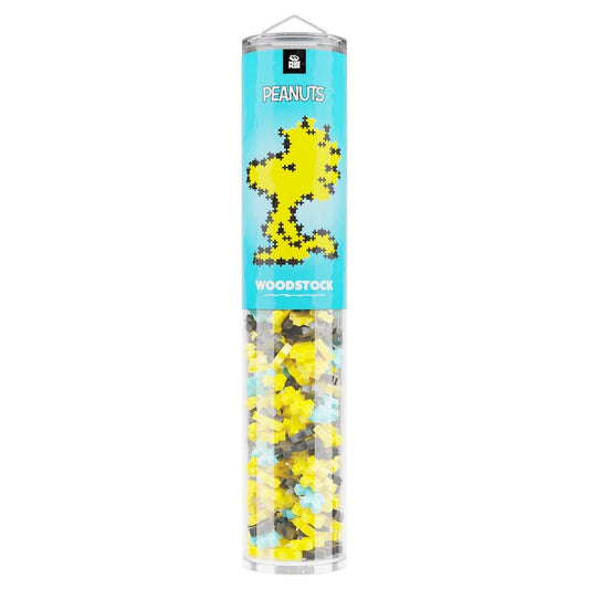 Tube of Peanuts Woodstock puzzle pieces with colorful design on a white background