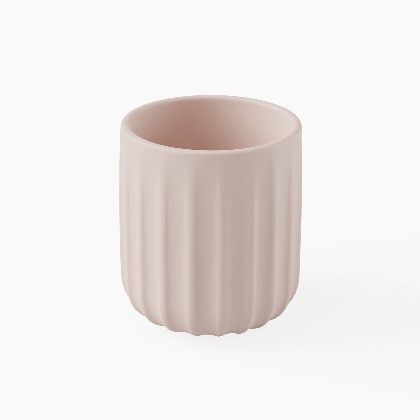Light pink silicone cup with ribbed texture on a white background