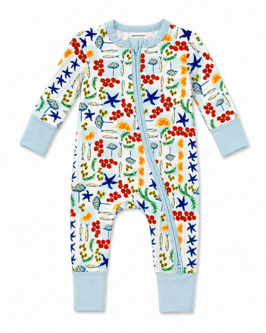 Colorful children's zip pajama with a pattern of stars, fish, and other sea creatures on a white background.