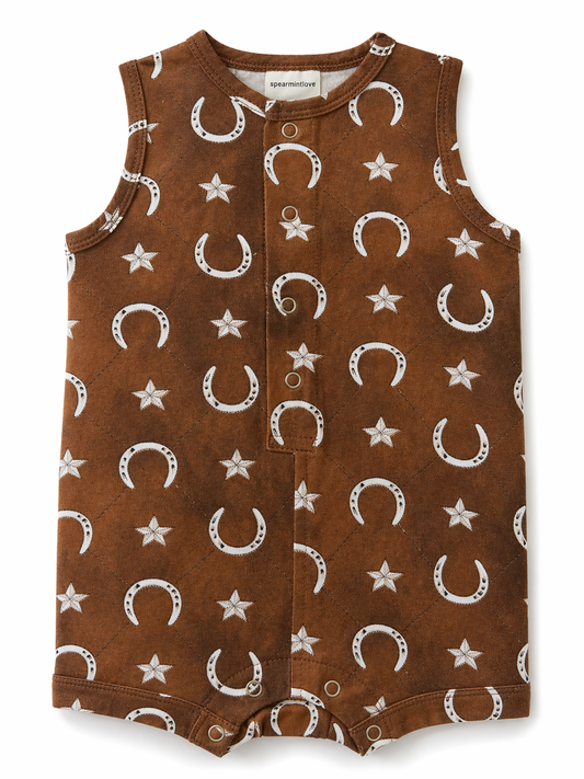 Brown sleeveless romper with white star and moon pattern on a white background