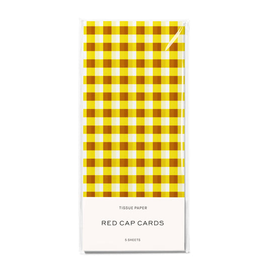Yellow and white checkered tissue paper packaging with 'Red Cap Cards' branding on a white background.