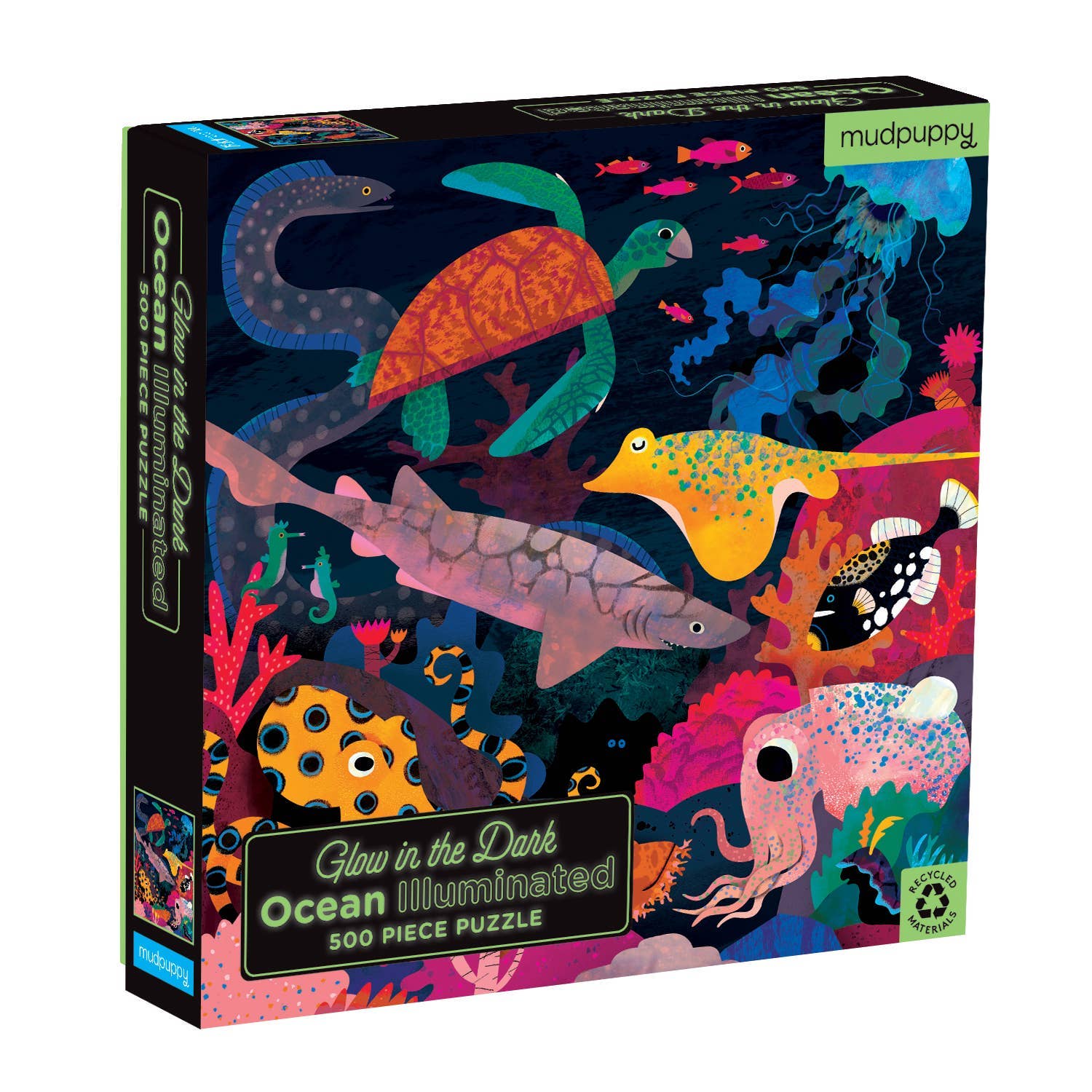 Glow-in-the-dark ocean-themed puzzle packaging with colorful sea creatures on a black background.