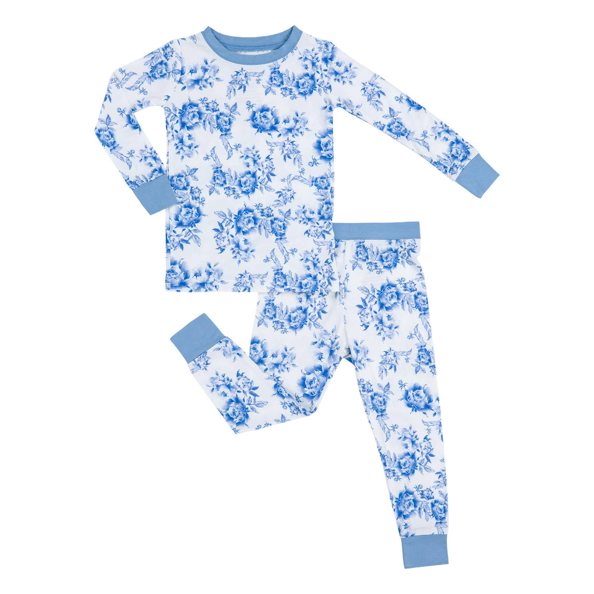 A two-piece children's pajama set featuring a long-sleeve top and matching pants with a blue floral toile pattern on a white background, finished with solid blue ribbed cuffs and collar.
