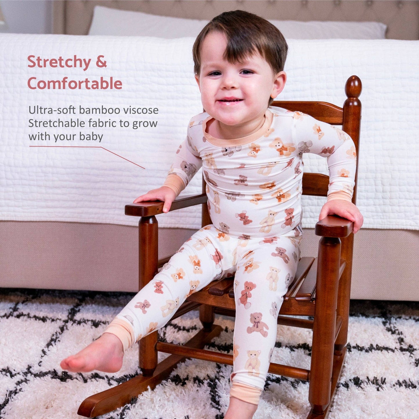 Child sitting on a wooden chair wearing a patterned outfit with text about stretchy and comfortable bamboo viscose.