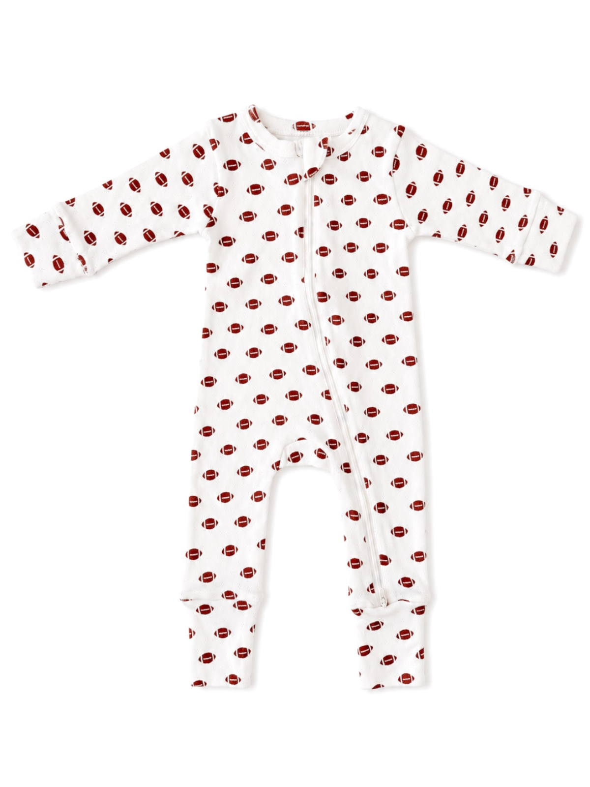 White baby onesie with brown football pattern on a white background