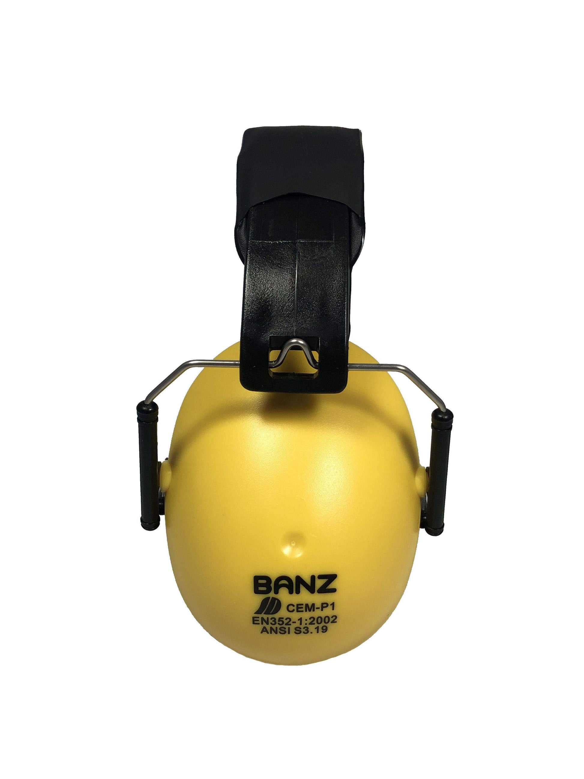 Yellow ear muffs with black clip on a white background