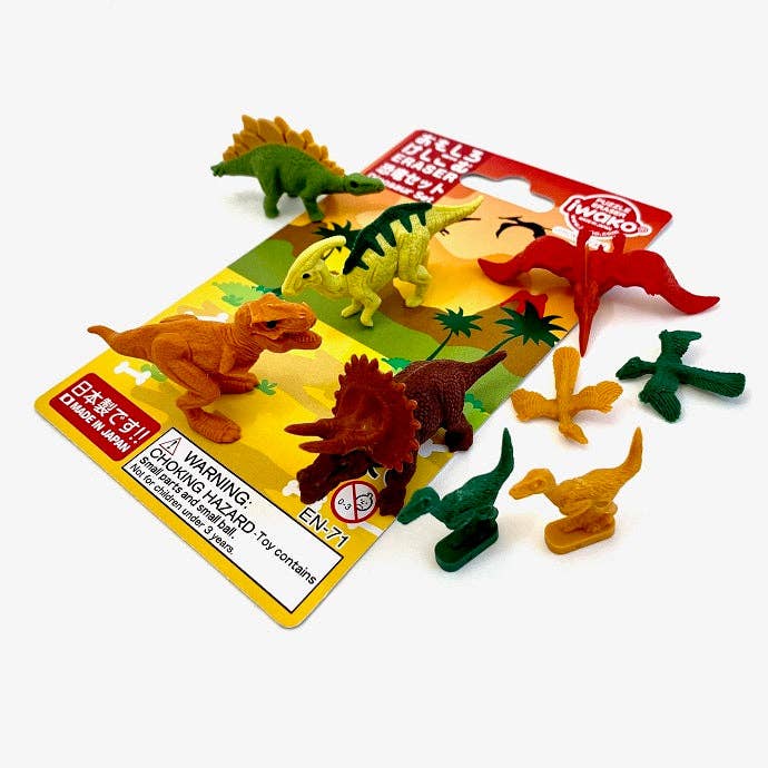 Set of colorful dinosaur toys with a packaging card on a white background