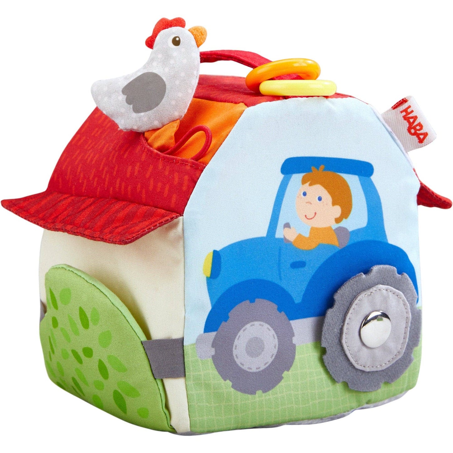 Children's soft toy with farm-themed design featuring a tractor and a chicken, on a white background.