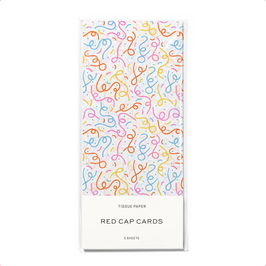 Tissue paper packaging with colorful loops pattern on a white background